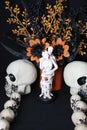 October Halloween wedding, with orange and black flower arrangement, skulls, spiders