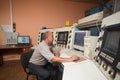 October 14, 2014. Kiev Ukraine. A middle-aged Caucasian man at work dispatcher plant control center, carefully analyzes the data