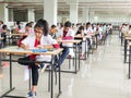 October 30, 2019, Kolkata, India. Medical students writing a medical examination in examination hall wearing white coats during