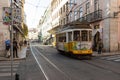 11 october 2022 Lisbon, Portugal: street of Lisbon - an old tram rides on the rails along the streets