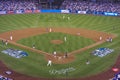 OCTOBER 26, 2018 - LOS ANGELES, CALIFORNIA, USA - DODGER STADIUM: Outfielder Cory Bellinger throws out Boston's Ian Kinsler as Aus