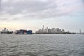 October 9, 2018, New York Harbor. A Container Barge Is Seen In Front Of The Lower Manhattan Skyline.