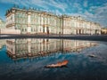 The Hermitage building is reflected in autumn. Palace square in Saint Petersburg Royalty Free Stock Photo