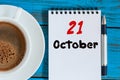 October 21st. Day 21 of month, morning drink cup with calendar on Database Administrator workplace background. Autumn Royalty Free Stock Photo