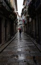 A Street walking in the Streets of Guimares, UNESCO World Heritage, chasing light and shadows, Guimares, Portugal. Royalty Free Stock Photo