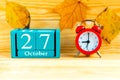 October the 27th. Blue cube calendar with month and date