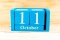 October 11th. Blue cube calendar with month and date