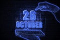 October 26th. A hand holding a phone with a calendar date on a futuristic neon blue background. Day 26 of month.