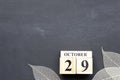 October 29th. Hello October, Cube wooden calendar showing date on 29 October.