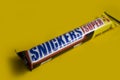 October 13, 2022 Ukraine city Kyiv Snickers delicious chocolate on a colored background