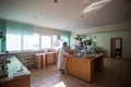 October 14, 2014.Ukraine.Kyiv. Caucasian middle-aged woman in a white coat in the chemical laboratory. A specialist at work, on