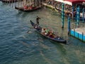 October 31, 2022 - Venice, Italy: Couple enjoying a gondola ride on the grand canal in Venice Royalty Free Stock Photo