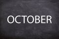 October white text with a blackboard background. And October is the tenth month of the year