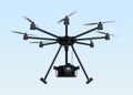 Octocopter with DSLR camera flying in the sky