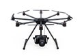 Octocopter with DSLR camera isolated on white background