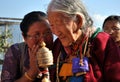 Octogenarian Tibetan Women Hold Prayer Wheel Royalty Free Stock Photo