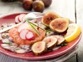 Octopus carpaccio over grapefruit Royalty Free Stock Photo