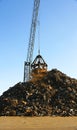 Octopus crane with scrap heap, Port of Barcelona Royalty Free Stock Photo