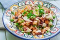 Octopus salad on bowl