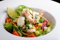 Octopus salad with lemon slice lettuce and potatoes Royalty Free Stock Photo