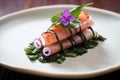 octopus sashimi with shiso leaf on top