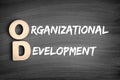 OD - Organizational Development acronym, business concept on blackboard