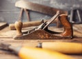 Od vintage hand tools on wooden background. Royalty Free Stock Photo