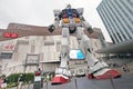 Odaiba Diver City Tokyo Plaza shopping mall and real-size Gundam robot in Tokyo, Japan