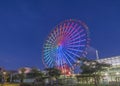 Odaiba illuminated Palette Town Ferris wheel named Daikanransha visible from the central urban area of Tokyo in the summer night Royalty Free Stock Photo