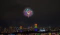 Odaiba,Minato,Tokyo,Japan on December7,2019:Rainbow Bridge as a perfect backdrop for fireworks during Odaiba Rainbow Winter Firewo Royalty Free Stock Photo