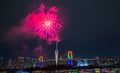 Odaiba,Minato,Tokyo,Japan on December7,2019:Rainbow Bridge as a perfect backdrop for fireworks during Odaiba Rainbow Winter Firewo Royalty Free Stock Photo