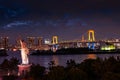 Odaiba Rainbow bridge and statue of Liberty with Tokyo bay view at night Royalty Free Stock Photo