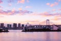 Odaiba Rainbow bridge with Tokyo bay view at evening sunset sky Royalty Free Stock Photo