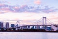 Odaiba Rainbow bridge with Tokyo bay view at evening sunset sky Royalty Free Stock Photo