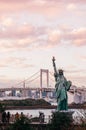 Odaiba Rainbow bridge with Tokyo bay view at evening sunset sky with tourists Royalty Free Stock Photo