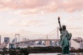 Odaiba Rainbow bridge with Tokyo bay view at evening sunset sky with tourists Royalty Free Stock Photo