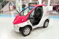 Odaiba, Tokyo, Japan - January 2, 2020: The Super-Compact Electric Vehicle COMS. Side view Royalty Free Stock Photo