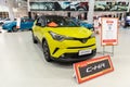 Yellow Toyota C-HR SUV. Toyota City Showcase Mega Web Palette Town