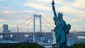 Odaiba, Tokyo. Rainbow Bridge and Statue of Liberty in Japan. Royalty Free Stock Photo