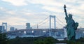 Odaiba, Tokyo. Rainbow Bridge and Statue of Liberty in Japan. Royalty Free Stock Photo