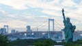 Odaiba, Tokyo. Rainbow Bridge and Statue of Liberty in Japan. Royalty Free Stock Photo