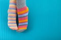 Odd Socks Day. Day lost socks, lonely socks on blue background. Royalty Free Stock Photo