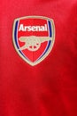 Logo of Arsenal Football Club on a red Jersey Royalty Free Stock Photo