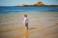 Ãâ¢oddler girl having fun on the beach in Saint-Malo, Brittany, France