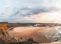 Odeceixe beach under the sun at sunset. The beauty of the Algarve region on the Atlantic coast of western Portugal. In the Royalty Free Stock Photo