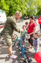 The event bicycle day. Bicyclists, adults and children, their portraits Royalty Free Stock Photo