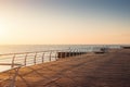 Langeron beach at sunrise: boardwalk promenade