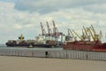 ODESA, UKRAINE - March 04. 2015. International Black Sea port in Odesa. Large cranes for loading cargo, grain for export Royalty Free Stock Photo