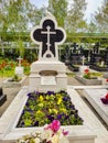 Odesa, Ukraine - May, 2023: Holy Dormition Monastery, the cemetry, the gravestone of Iona. Orthodox Church, grave of priest