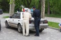 Odesa, Ukraine - May 15, 2016: Ukrainian police officer and driver filling documents